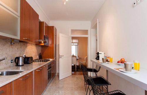 Santa Maria Maior Apartment | JOIVY Stylish 2BR Apt w/balcony at the heart of Baixa