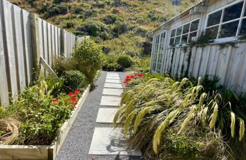 Wellington House | Juliet’s beachfront bach on Wellington’s wild south coast