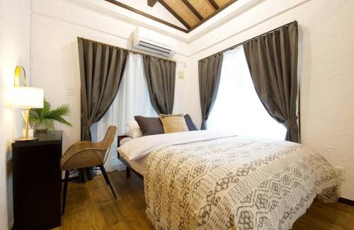 Sakimotobu Apartment | Junglia Okinawa 崎本部戸建プール付き f