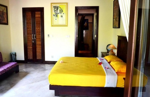 Sukawati House | Junior Suite room in Sukawati, surrounded by lush gardens