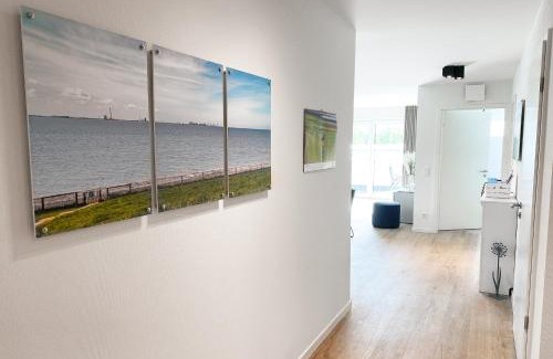 Tossens Apartment | KÜSTE33/48 – Penthousewohnung mit Dachterrasse, Sauna - strandnah!