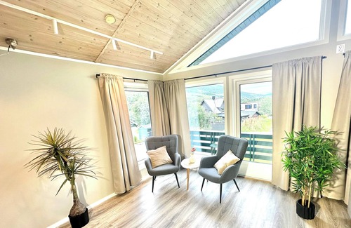 Tromso Apartment | Kaldfjord Aurora Apartments New top floor. Free parking. Close to nature.