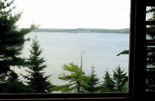 Brooksville Cottage | Kayaker's paradise at Piper's Nest Cottage overlooking Smith Cove