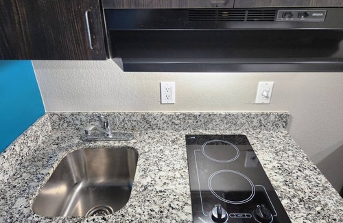 Wharton Hotel | King Room with Kitchenette, Free Breakfast, and Parking!