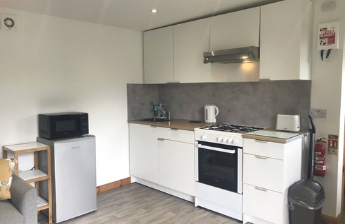 Stenalees Cabin | Kingfisher - our cosy, spacious glamping cabin at Mena Farm, Cornwall