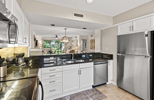 Arcadian Shores Villa | Kingston WHP 2B Ground level Villa w/pool/beach