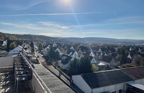 Kaiserslautern Apartment | KL11: Modern 2-bedroom penthouse with 270° rooftop views in Kaiserslautern.