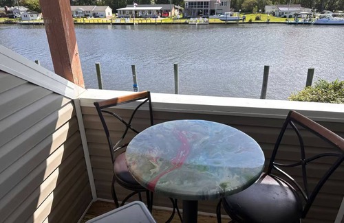 Coinjock Apartment | Knot Four- Balcony View of ICW- Dog Friendly!