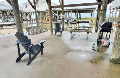 Golden Meadow House | Knot Workin - Boat Access - Island Realty