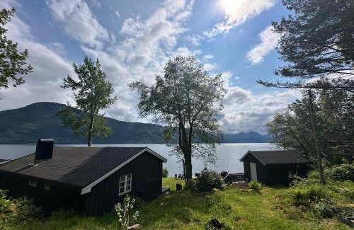 Glomset House | Koselig hytte i sjøkanten