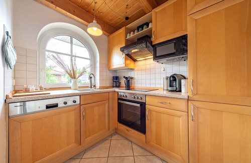 Sturenburgshof House | Lüttje Huck - Ferienwohnung 2 mit Seeblick & Sauna