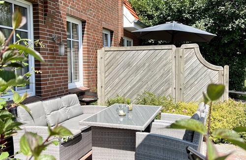 Tannenhausen House | Lüttje Huck Ferienwohnung 4 - mit Sauna & Seeblick