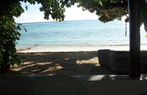 Mahe Island Villa | "L'Escapade Beach Villa" Seychelles, nestled on white sand beach, palms and sea