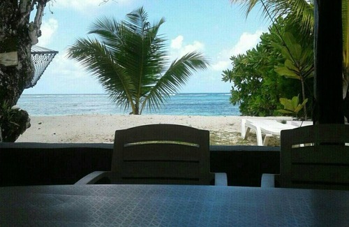 Mahe Island Villa | "L'Escapade Beach Villa" Seychelles, nestled on white sand beach, palms and sea