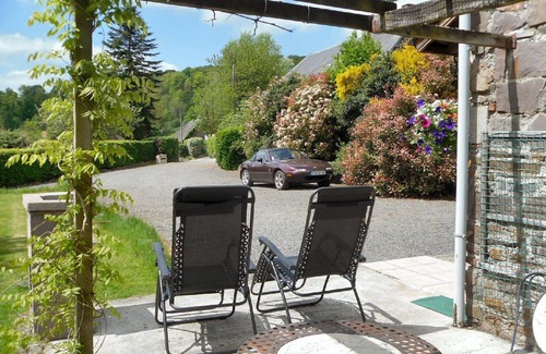 Saint-Denis-le-Gast Cottage | La Cachette stone detached gite in peaceful Normandy with own private garden