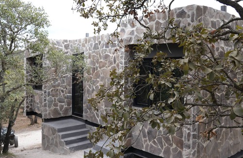 Sierra de Lobos Hotel | La Forêt Cabañas Boutique