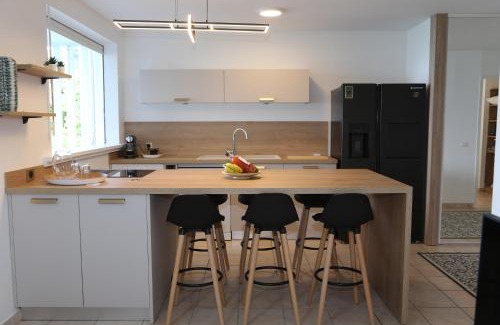 L'Houezel Apartment | La vue du phare - Appartement neuf avec vue imprenable et acces crique