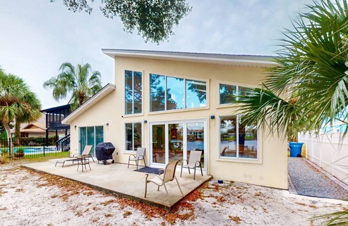 Silver Sands House | Lagoon-front home with dock & soaking bathtub
