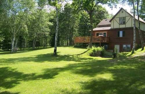 Audubon Cabin | Lake Front Big Yard Fishing Dock Paddle Boat AC Campfire Swimming Grill Deck