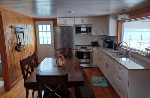 Reed City Cabin | Lake front Cabin great for boating, fishing, skiing, tubing, weekend getaway.