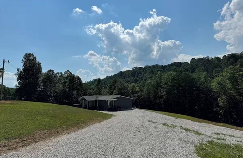 Big Creek House | Lake Front Property with a gentle path to a private dock and lake. 3bed 2 bath