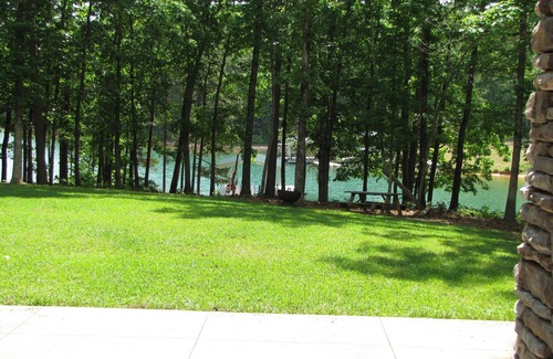 Pine Ridge Point House | Lake Front, Quiet, Private cove on 4.75 acres, Canoe, 2 Kayak, 2 boat docks