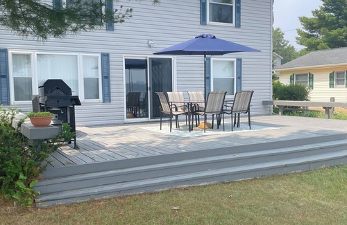 Oscoda House | Lake house paradise w/boat dock, fire pit, and close to trailhead