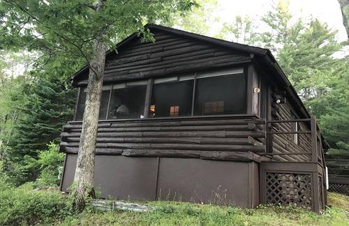 Freedom Cabin | Lake Ossipee New Hampshire waterfront cabin with beach, dock, fire pit, privacy.