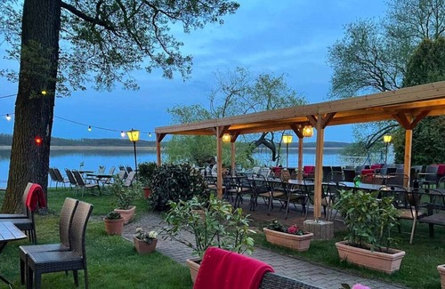 Mellensee Apartment | Lake view apartment direct water access. - Restaurant am Wildpark