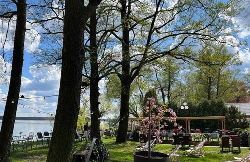 Mellensee Apartment | Lake view apartment direct water access. - Restaurant am Wildpark