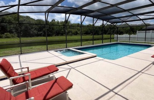 Crescent Lakes House | Lake View - South Facing Pool & Spa - Game Room - Nr Disney - Quiet Community