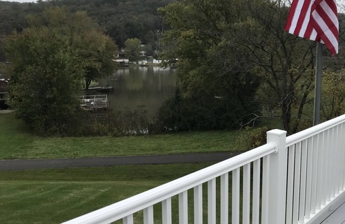 Waverly House | Lake Whitetail Cottage 3/2 with a carport & large back porch.