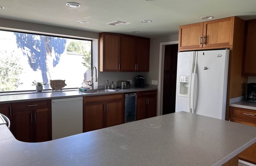 Oak Shores House | Lakefront Chateaux with Dock, Unique Rock Wall for Privacy, and Internet