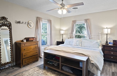 Silver Creek Village House | Lakefront Cottage with Private Dock, Wood-Burning Fireplace and Sunroom