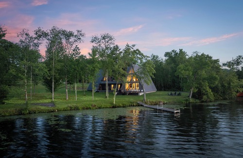 Castleton House | Lakefront Haven/ Private Dock Fire Pit EV Charger