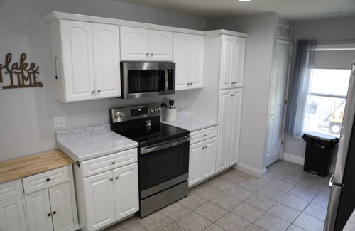 Lake Ozark House | Lakefront Home: Quiet cove w/large porch for entertaining! 9 MM off HH!