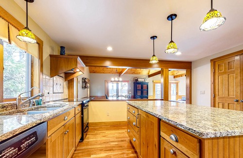 Freedom House | Lakefront home with a private beach, dock, grill, deck, W/D, and AC