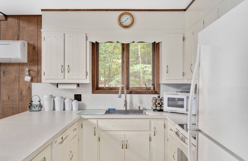 Gouldsboro House | Lakefront Poconos, Private beach, kayaks, rowboat, paddleboards and paddleboat