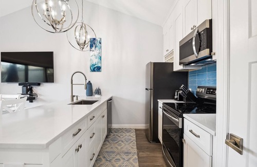 Bethany Beach Condo | Lakefront Sea Colony Villa! Amenity Rich with Private Beach and Shuttle!