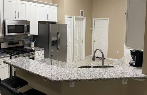 Crescent Lakes House | Lakefront Villa with private heated pool. 30 Minutes from Disney / Universal!