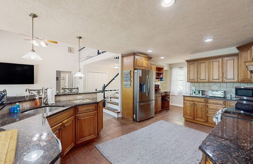 Mineral House | Lakefront with pool, hot tub, dock, SUPs, water carpet, billiards, foosball, gym
