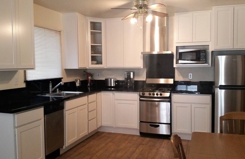 Peninsula Village Cabin | Lakeside cabin, remodeled, cozy, pet friendly with boat launch & free boat slip.