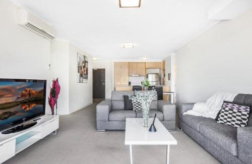 Merrimac Apartment | Lakeside Family Oasis with Pool, Gym and Balcony