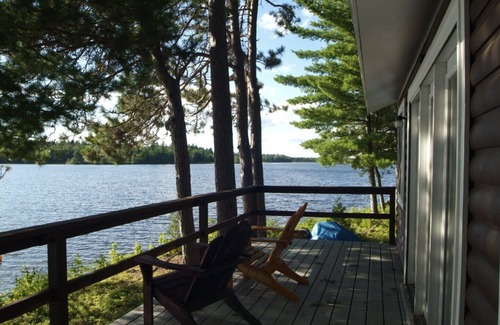 Princeton Cabin | Lakeside Log Cabin: Breathtaking Natural Beauty Pocomoonshine Lake Bass fishing