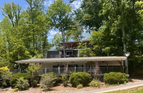 Eddyville Cabin | Lakeside Place 1 (Sleeps 1-6) - Tiny living space with a queen bed, and 3 twin beds perfect for kids
