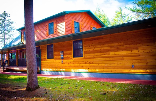 Neillsville Cabin | Lakeside Retreat with Private Docks, Hot Tub, Scenic Views and Near Trails