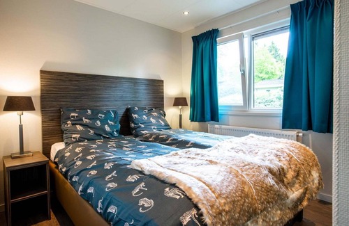 Aalst Ski Chalet | ✓ Landhuis at Recreatiepark het Esmeer ✓ Holiday home for 4 persons ✓ Located in Aalst (Gelderland) ✓ Waterside holiday park ✓ Book directly through the park