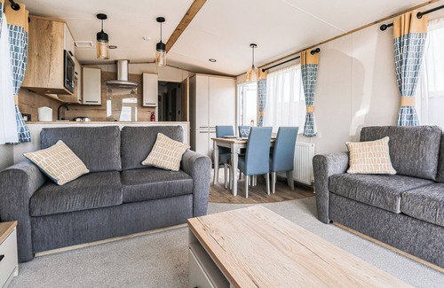 Cardigan House | Large 12ft-wide caravan with one double with en suite W.