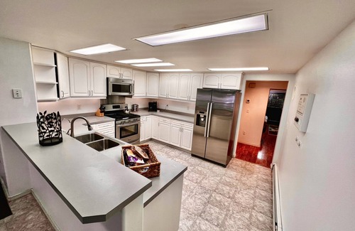 Rabbit Creek Apartment | Large 4 Bedroom, Minutes from Mountains, Inlet, Airport and Downtown.