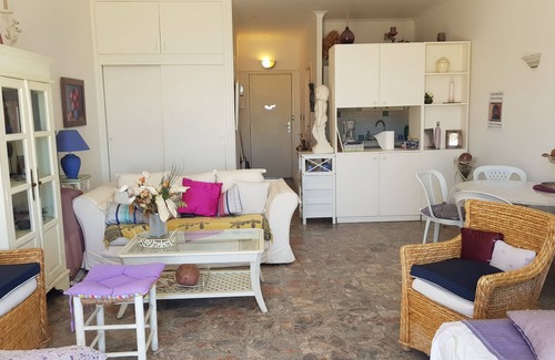 Le Ricanto Apartment | Large bright studio with terrace on the beach with sea and city view